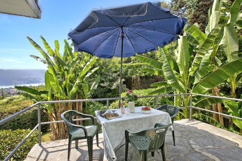 Agno Apartment | Apartment View And Pool - Happy Rentals