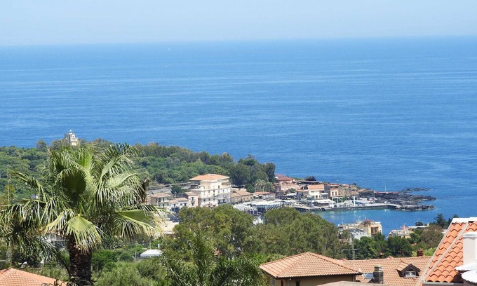 Aci Catena Apartment | Attic overlooking the sea of the Cyclops