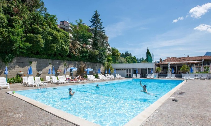 Susello Apartment | Attractive studio with terrace and garden, pool and dream view