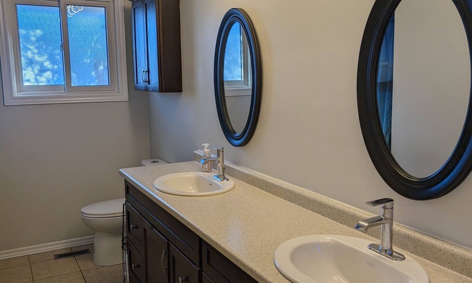 Kitchener House | Backyard Oasis with Pool, Hot tub & Fire table. 4 bedrooms, gym, & a yoga area!