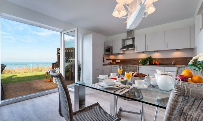 Olpenitz Apartment | Baltic Sea vacation apartment "Schleiperle" - with water view, sauna and two terraces