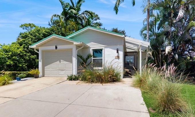 Naples Park House | Beach home with outdoor sundeck, hot tub, enclosed yard & patio