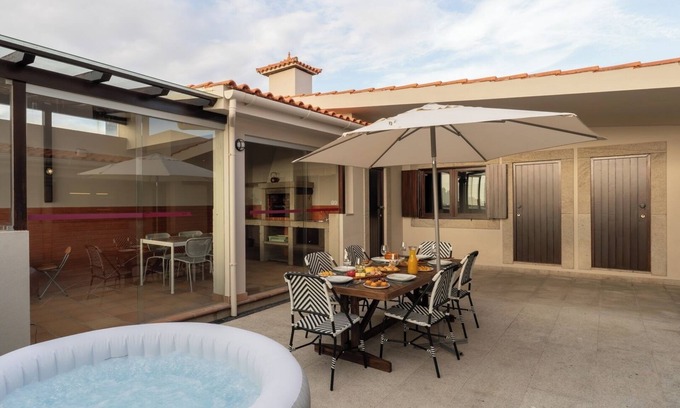 Vila Cha House | Beach Villa with Jacuzzi and Garage by HostWise