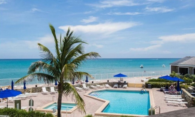 Jupiter Resort | Beachfront secluded two bedroom in Jupiter reef club resort