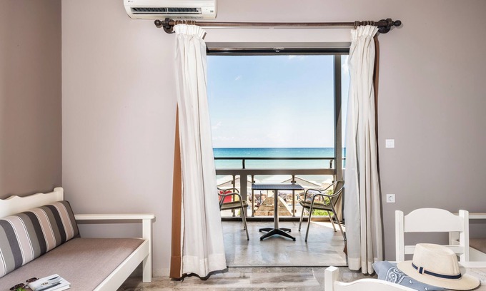 Kato Stalos Apartment | Beachfront Two Bedroom Apartment with kitchenette. nLia Bechfront Apartments