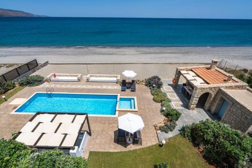 Rapaniana Villa | Beachfront villa Turquoise with private pool, BBQ and ping pong table