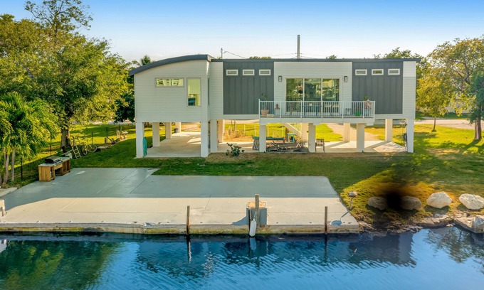 Doctor's Arm House | Beautiful waterfront home with central AC, dock, lovely balcony & patio