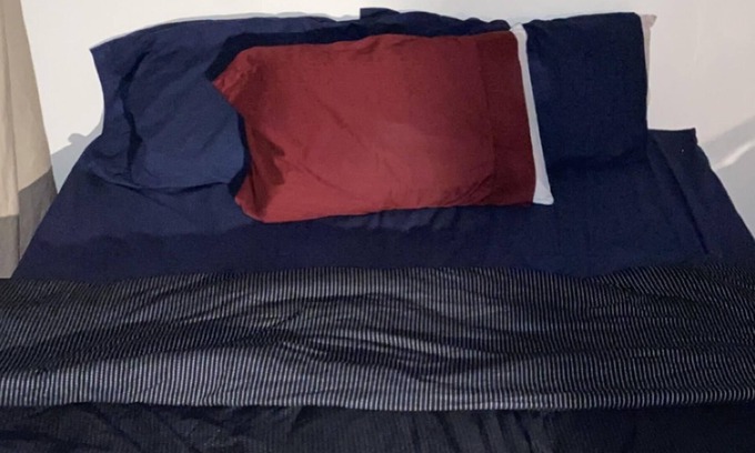 South Weymouth Apartment | Beds in living room space blocked off by curtains!