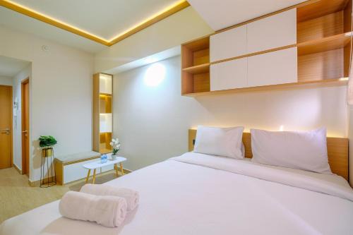 Pondokcina Apartment | Best Deal and Tidy Studio at Evenciio Margonda Apartment By Travelio