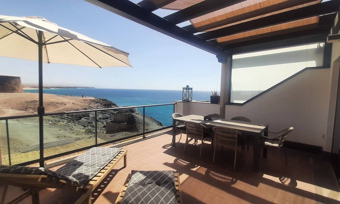 El Cotillo Apartment | Best location on 2 floors (with penthouse) directly by the sea. Dream view from 3 terraces
