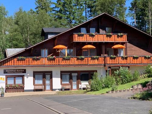 Bischofsdhron Apartment | Bichlhof Bärfra Ferienwohnung Am Brunnen