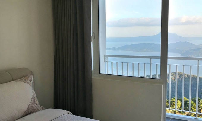 Silang Junction North Apartment | Blowing in the Wind Taal Lake View - 1 Bedroom Corner Apartment with Balcony