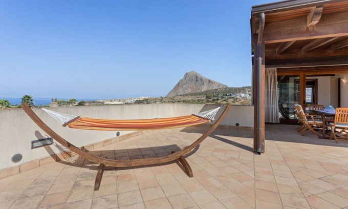 Custonaci Apartment | Bright and welcoming 35sqm apartment located on the first floor of an independent villa in Custonaci, a quiet countryside location a short distance from Erice and Cornino! The apartment has a large terrace with outdoor furniture and is completely indepen