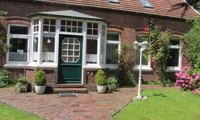 Dornum Apartment | Bright charming apartment with garden, terrace, WLAN