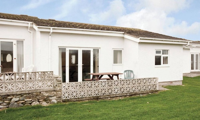 Trearddur Bay Cottage | Bungalow with one double with wash basin, one double and one twin.