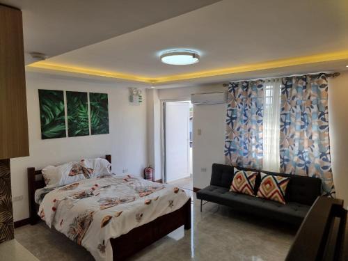Tanza House | C Mary's Staycation in Tanza Cavite Condo Type with balcony good for 2 person