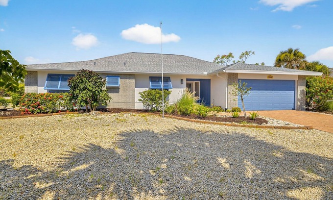 Shell Harbor House | Canal front beauty! NEW