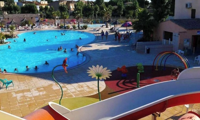 Serignan RV Rental | Caravan 'Mobilhome 8pers Les Sables Du Midi' with Private Terrace, Wi-Fi and Air Conditioning
