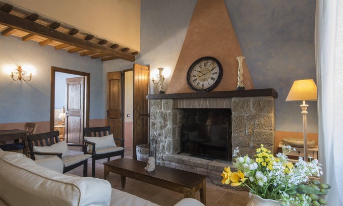 Commenda Apartment | Casa Cristoforo, four rooms plus, with fireplace and terrace on the olive grove