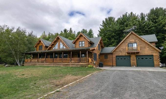 Wilmington House | Cedar Log Home sits on 41.87 private acres with mountain and meadow views