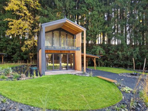Mlade Buky Ski Chalet | Chalet Luxe Timber Lodge & Relaxing Bath by Interhome