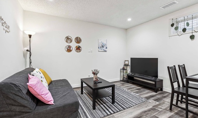 Cranston House | Charming 1BR Basement Suite w Parking—Calgary