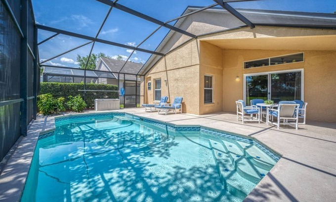 Lake Berkley Villa | Charming 3BR home in Kissimmee with private pool and lake view, perfect for families.