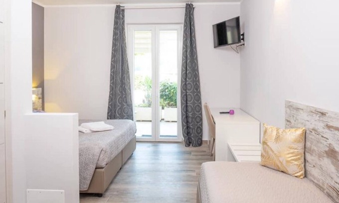 Costermano Villa | Charming 4-bedroom estate in enchanting Albaré Stazione with AC, WiFi