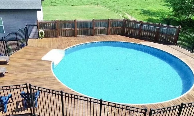 Eldon Other | Charming 4-bedroom farmhouse in Eldon with pool, hot tub & firepit!