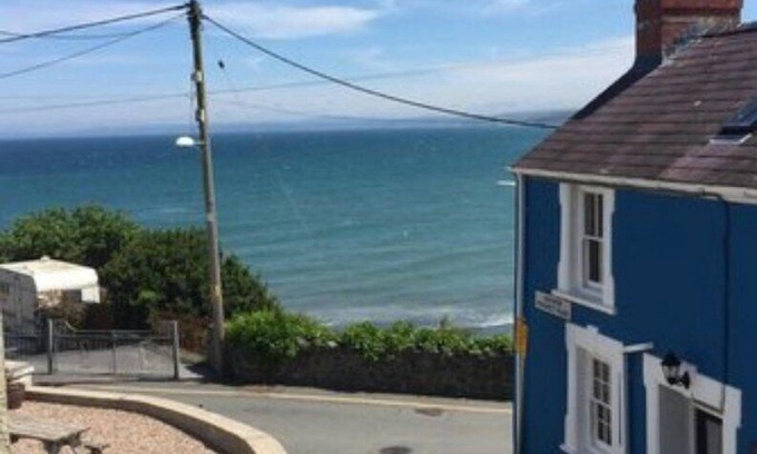 New Quay House | Charming semi-detached cottage in New Quay. Sea views from the windows. Family-friendly location
