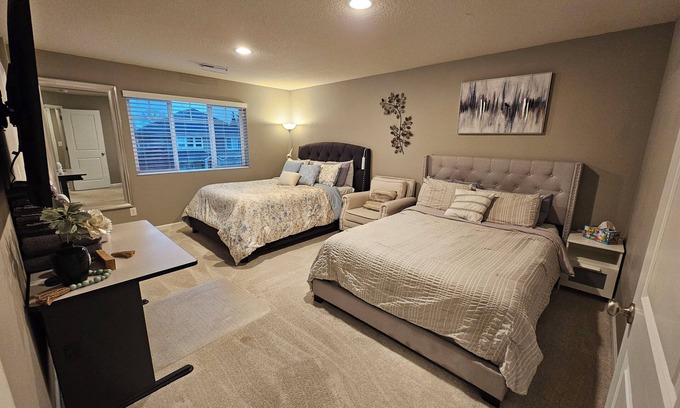 Rock Creek House | Cheerful Bedroom in Relaxed Home