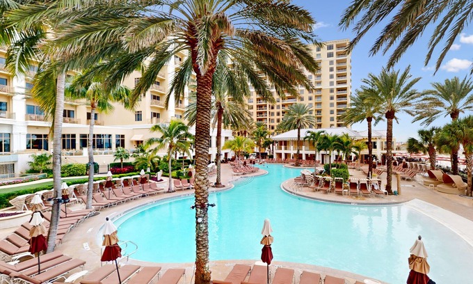 Clearwater Beach Condo | City View condo with beach access, pools, hot tub, gym, AC, & W/D