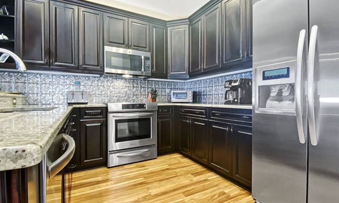 Indian Shores Condo | Coastal condo with striking sunrise & wildlife views - pool, fishing dock access