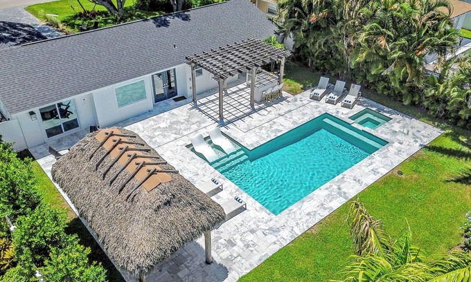 Naples Park House | Coastal Getaway w/Pool, Spa & Tiki Lounge