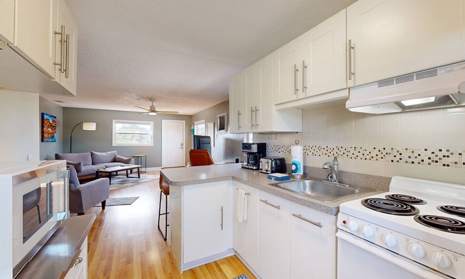 Melbourne Beach Condo | Coastal retreat w/ocean view and breezes, balcony, WiFi, AC, steps to the beach