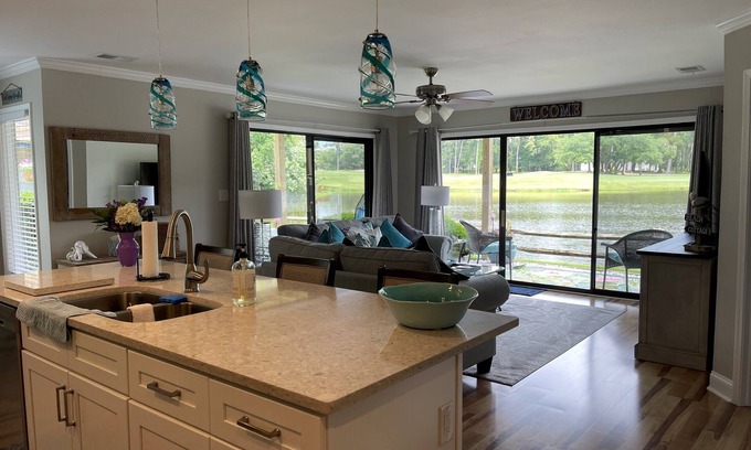 Sea Trail Condo | Coastal Retreat with Lake and Golf Course Views!