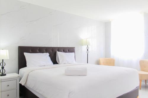 Serpong Apartment | Comfort and Spacious 2BR Apartment at Tuscany Residence BSD City By Travelio