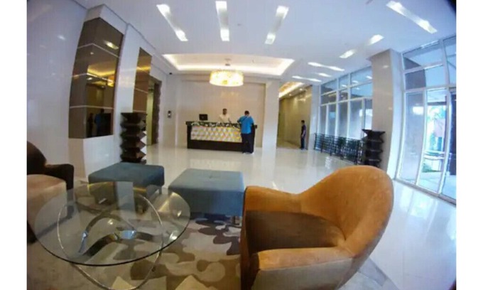 Bagumbayan Condo | Comfy, spacious 1BR unit +balcony, wifi, Smart TV & Netflix-ready, pool, gym
