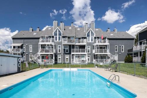 Magog Apartment | Condo-piscine à 200M du Memphré