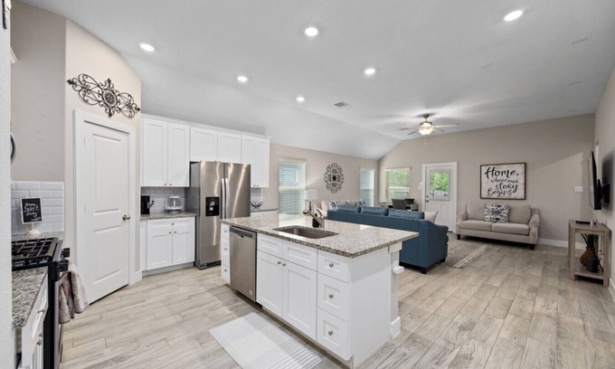 Conroe House | Conroe 3BR Sleeps 12 | Fenced Yard + Garage Games