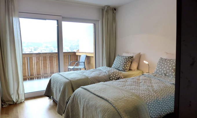 Blausee Apartment | Cosy apartment for 4 guests with WIFI, TV, balcony, pets allowed and panoramic view