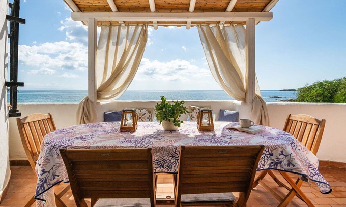 Province of Cagliari Villa | Cosy apartment in villa for 8 people with A/C, WIFI, TV and patio