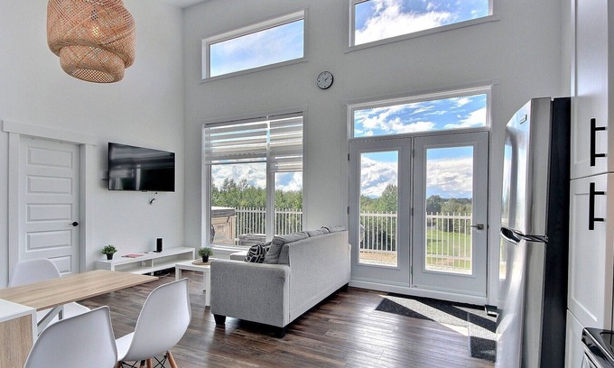 Alma Ski Chalet | Cottages with private SPA / Waterfront / Lac-St-Jean