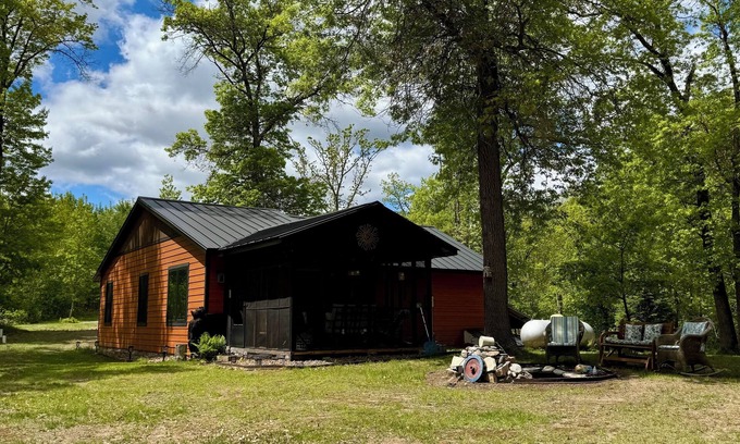 Webb Lake Cabin | Cozy 2 bedroom cabin with fireplace, lake views, steps to sand bottom swimming