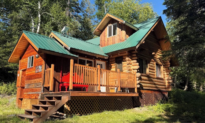 Bigfork Cabin | Cozy cabin bordering forest service trails. Perfect escape on 10 acres of forest