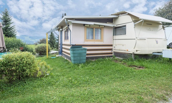 Weiler-Simmerberg RV Rental | Cozy Caravan “Camping Stellplatz Nr. 43” with Mountain View, Garden Area & WiFi; Parking Available