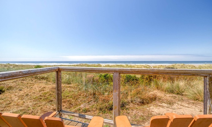 Bayshore House | Cozy Oceanfront Home with Wrap Around Windows! Beach access on the property!