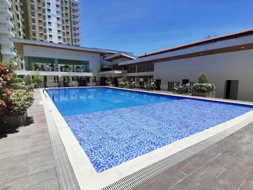 Cagayan de Oro Apartment | Cozy Studio with Balcony in Mesaverte near SM Downtown 4pax max with Free Pool & Netflix
