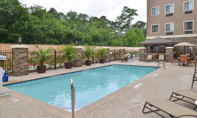 Tomball Condo | Cozy Suite in Tomball | Business Center On-Site + Free Breakfast!