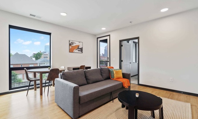 Lockerbie Square Apartment | CozySuites Mass with parking, lounge and roof deck 5